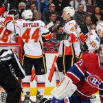 Flames Celebrate Goal in Habs Home Opener
