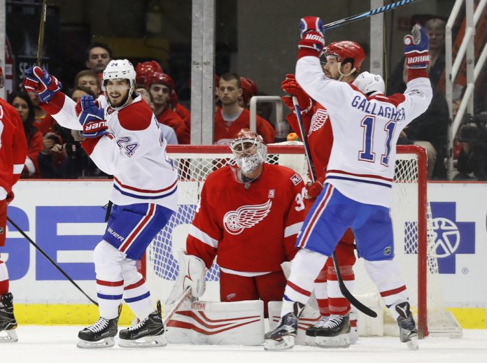 Montreal Canadiens' Phillip Danault (24) and Brendan Gallagher (11)